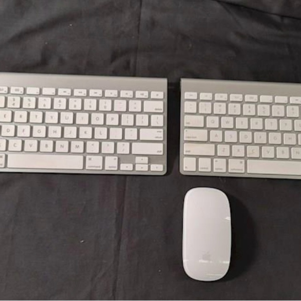 Two Sleek white Wireless Keyboards and 1 mouse apple brand. Used.